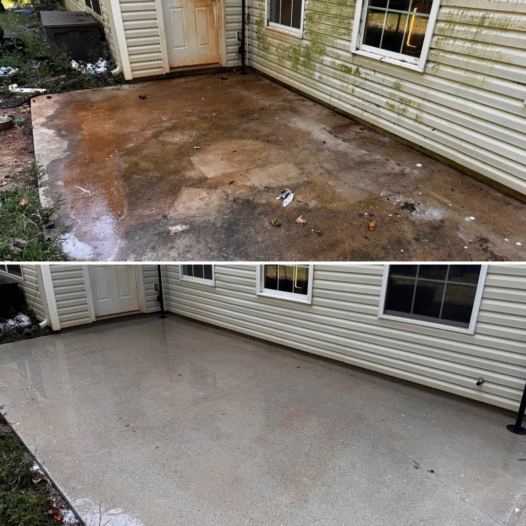 Concrete patio beside a house before and after cleaning